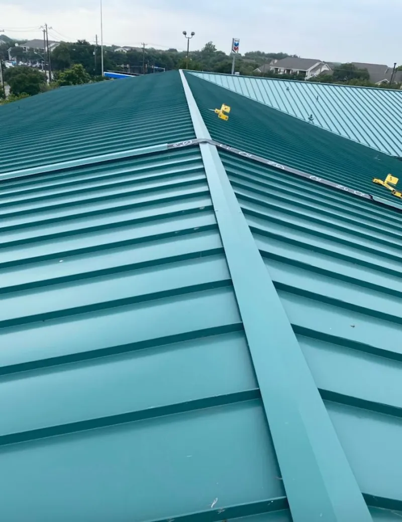 Green commercial metal roof ridge and valley for Metal Roof Repair in Henderson
